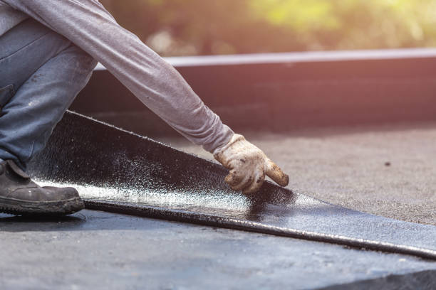Professional Basement Waterproofing technician working in Amherst, WI